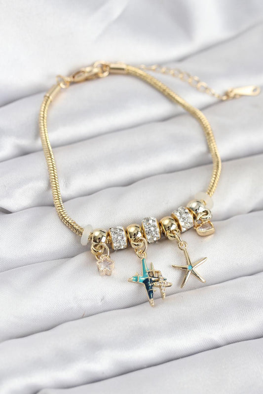 Pirinç Gold Renk Yıldız Model Charmlı Kadın Bileklik